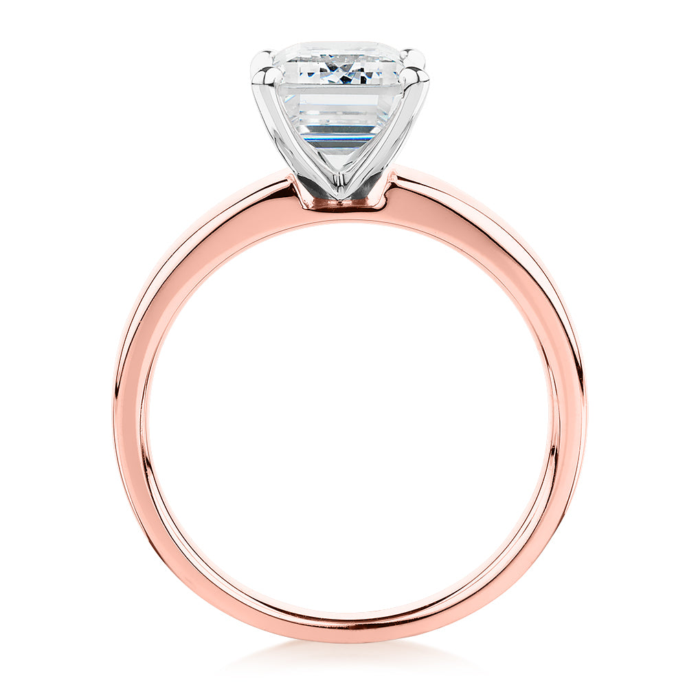 Emerald Cut solitaire engagement ring with 3.01 carat* diamond simulant in 14 carat rose and white gold