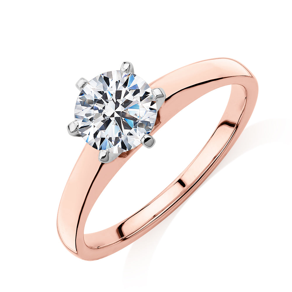 Round Brilliant solitaire engagement ring with 1 carat* diamond simulant in 14 carat rose and white gold