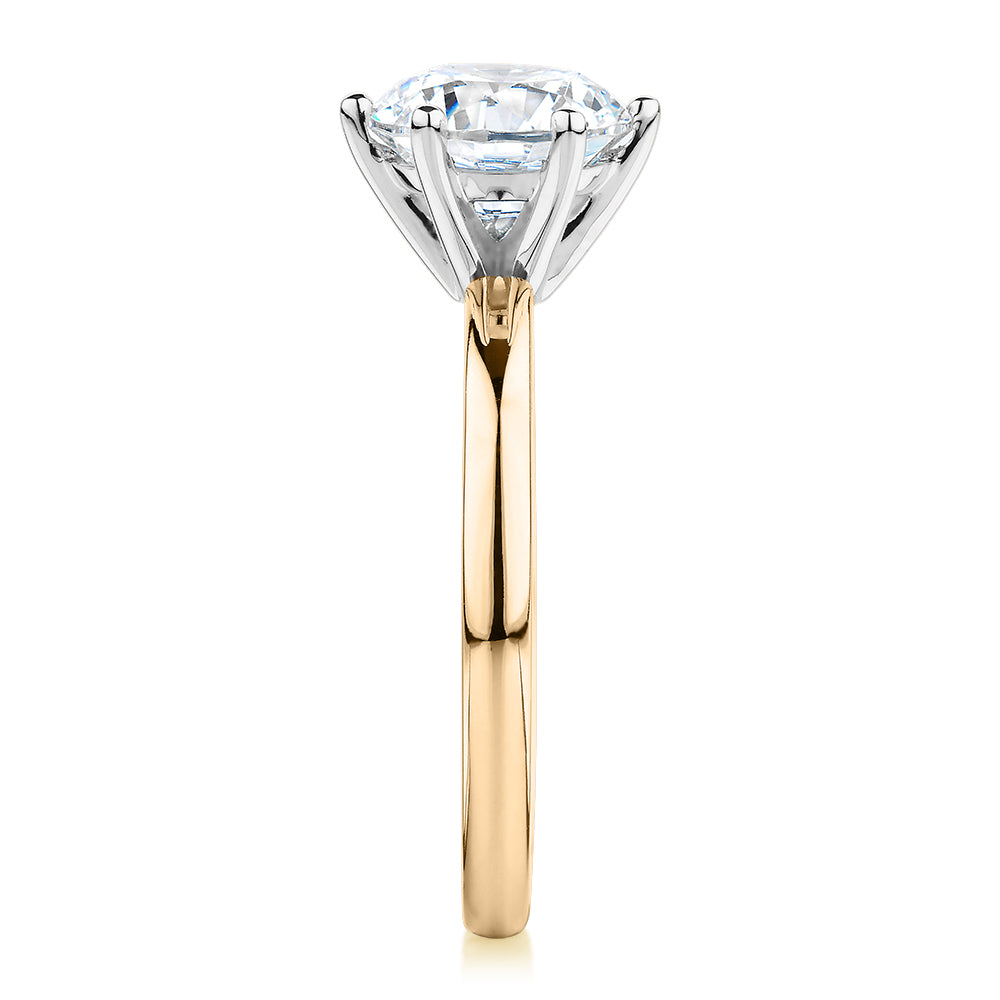 Round Brilliant solitaire engagement ring with 2 carat* diamond simulant in 14 carat yellow and white gold