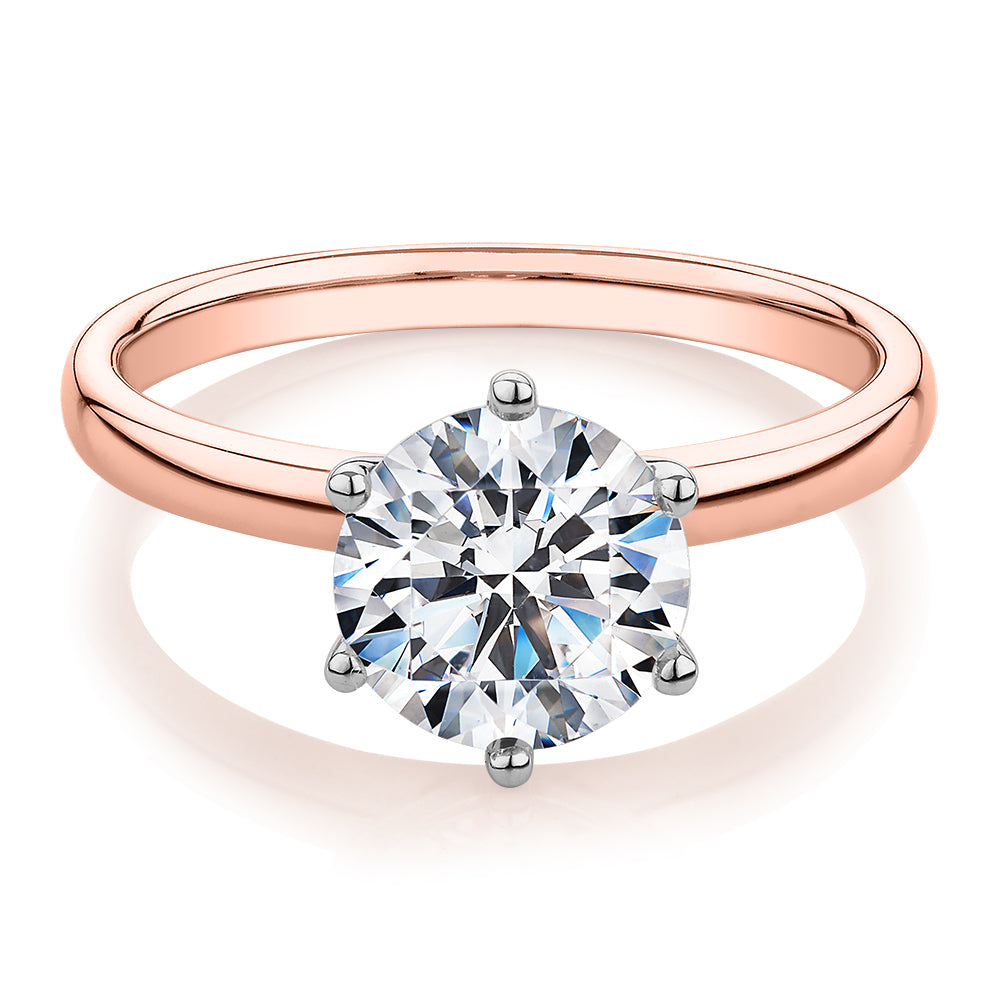 Round Brilliant solitaire engagement ring with 2 carat* diamond simulant in 14 carat rose and white gold
