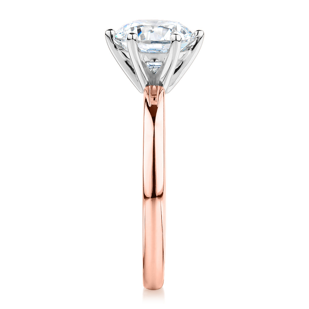 Round Brilliant solitaire engagement ring with 2 carat* diamond simulant in 14 carat rose and white gold