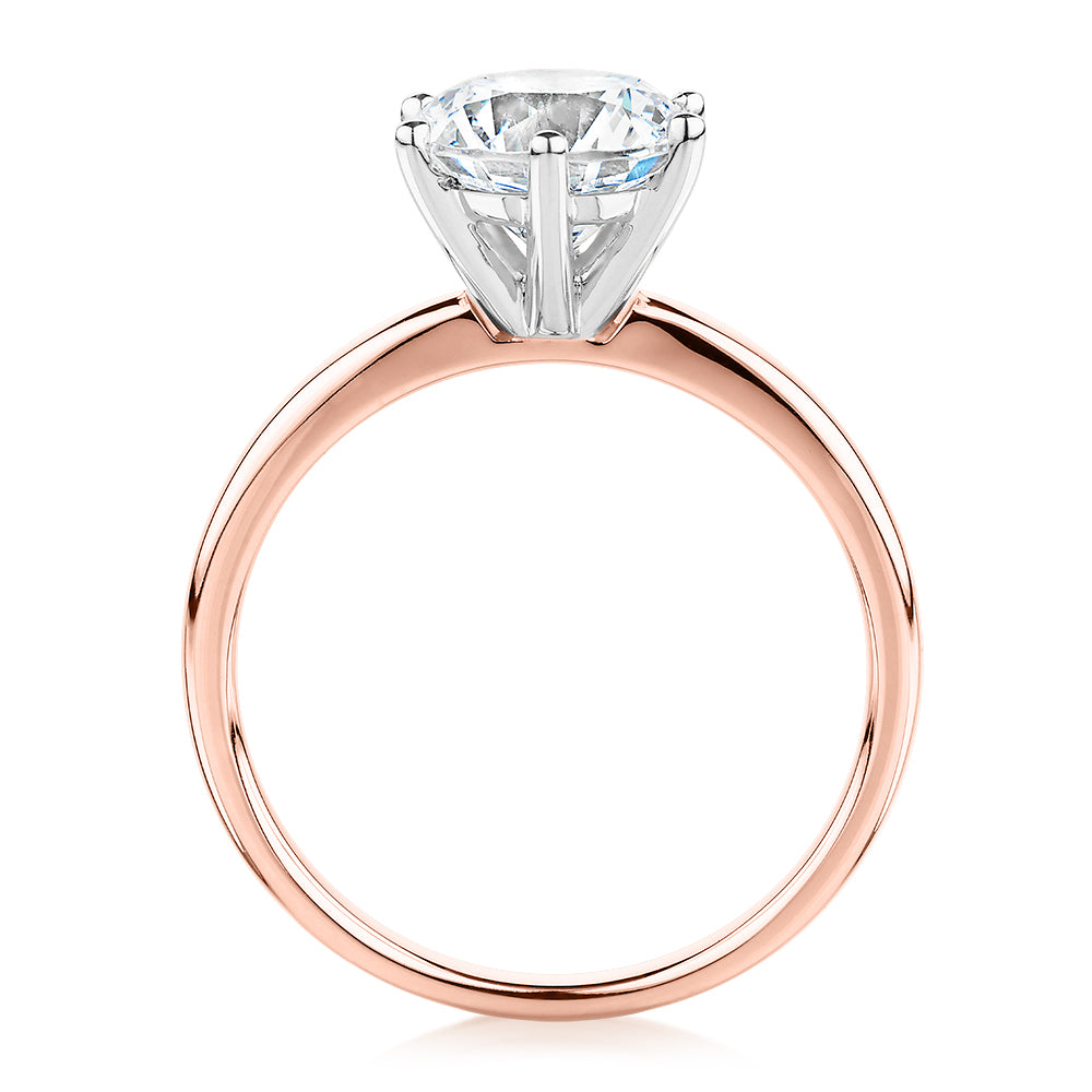 Round Brilliant solitaire engagement ring with 2 carat* diamond simulant in 14 carat rose and white gold