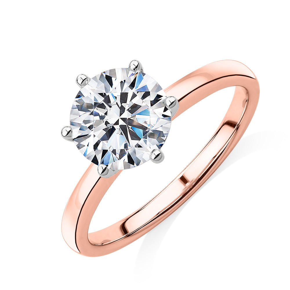 Round Brilliant solitaire engagement ring with 2 carat* diamond simulant in 14 carat rose and white gold