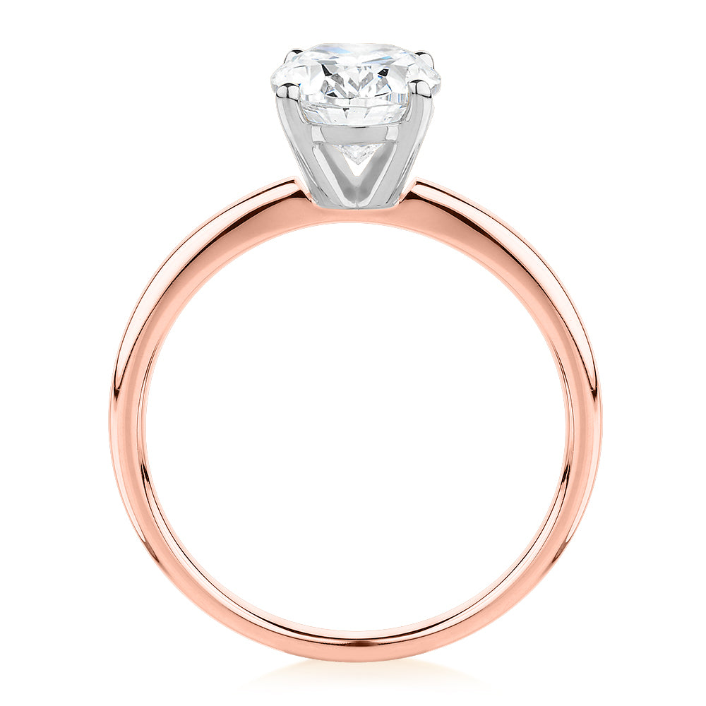 Oval solitaire engagement ring with 1.86 carat* diamond simulant in 14 carat rose gold