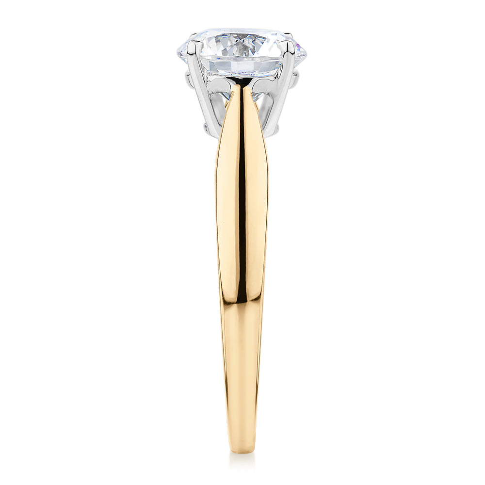 Round Brilliant solitaire engagement ring with 1.5 carat* diamond simulant in 14 carat yellow and white gold