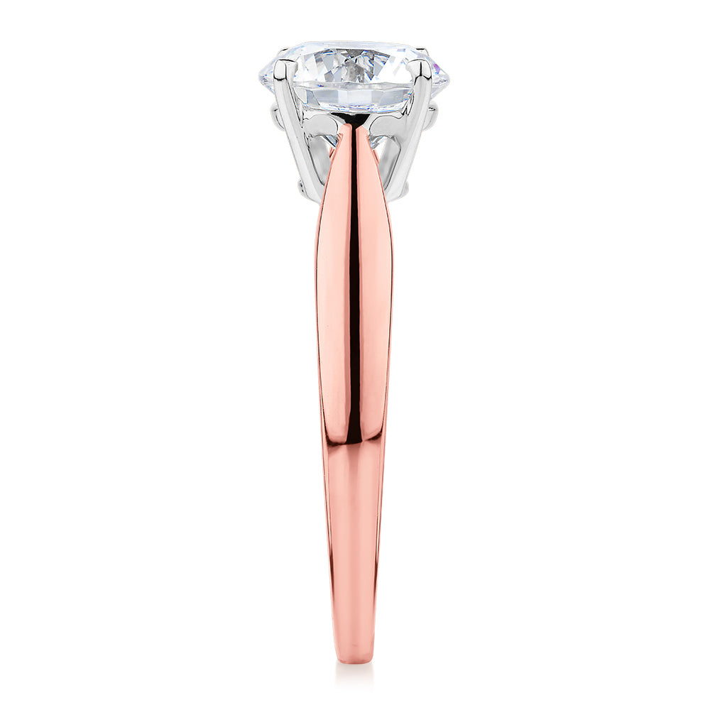 Round Brilliant solitaire engagement ring with 1.5 carat* diamond simulant in 14 carat rose and white gold