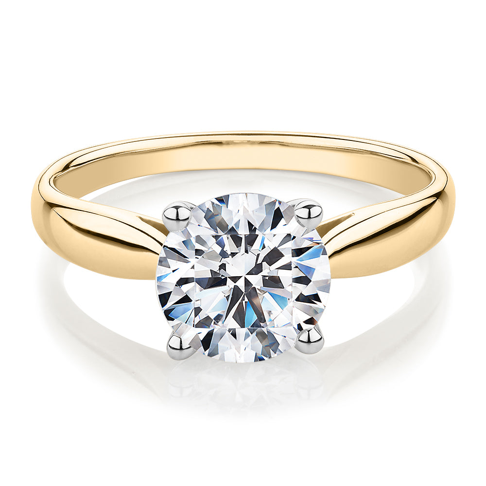 Round Brilliant solitaire engagement ring with 2 carat* diamond simulant in 14 carat yellow and white gold