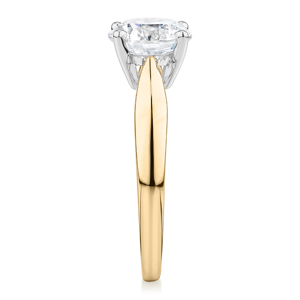 Round Brilliant solitaire engagement ring with 2 carat* diamond simulant in 14 carat yellow and white gold