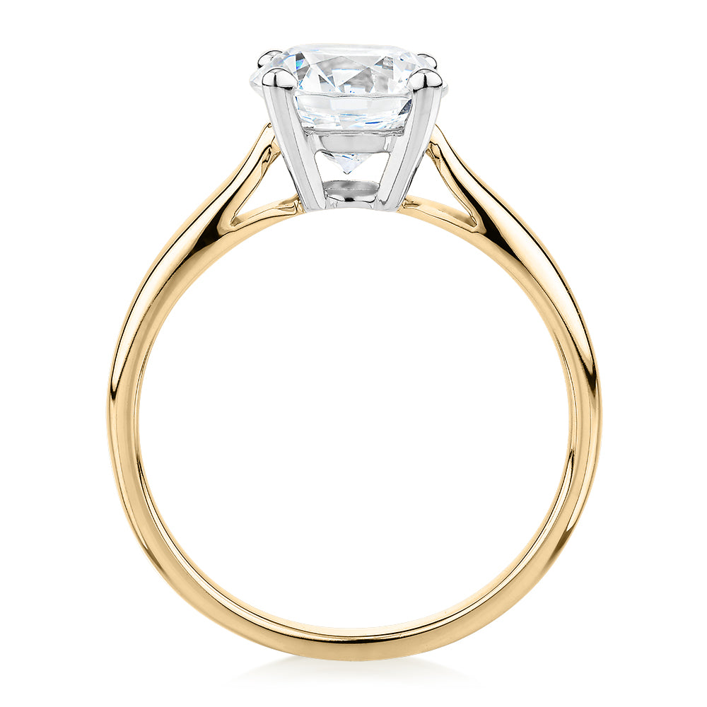 Round Brilliant solitaire engagement ring with 2 carat* diamond simulant in 14 carat yellow and white gold