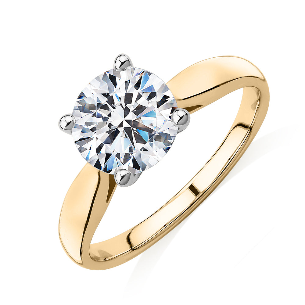 Round Brilliant solitaire engagement ring with 2 carat* diamond simulant in 14 carat yellow and white gold