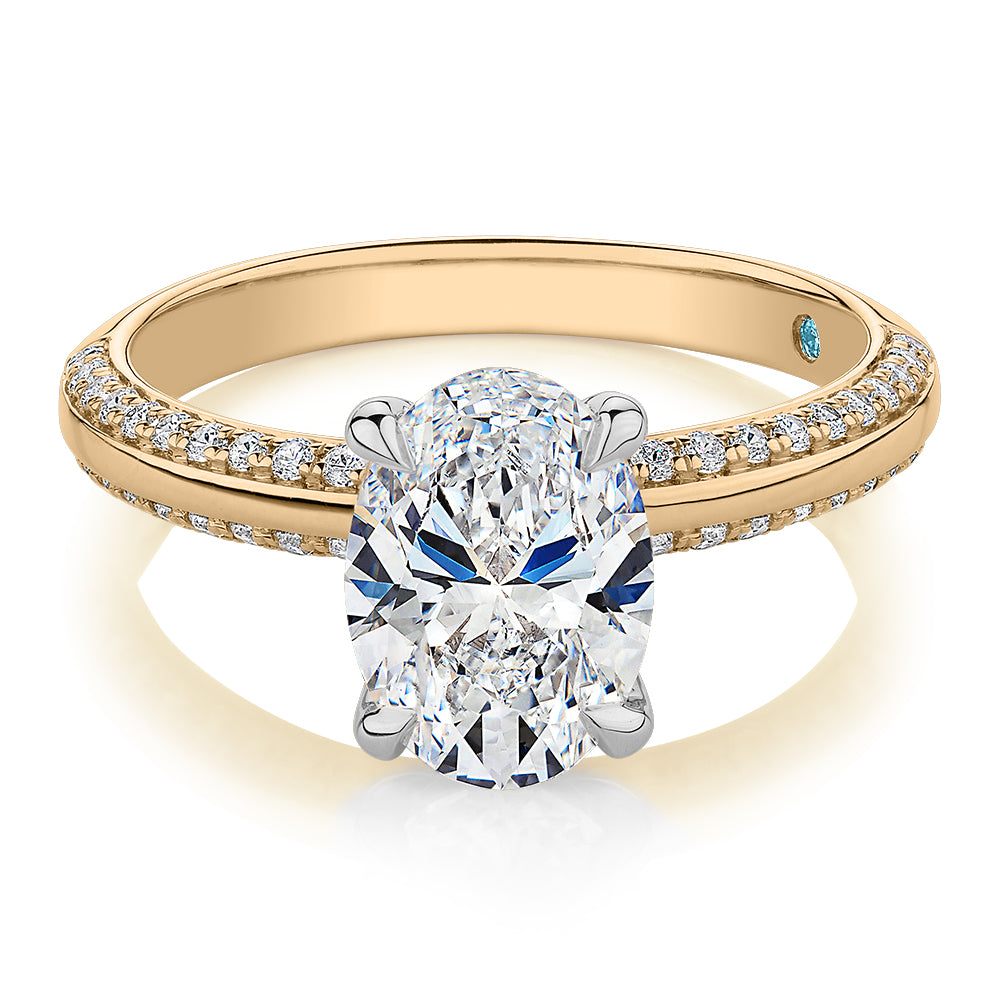 Premium Certified Lab-Grown Diamond 2.24 carat TW oval cut shouldered engagement ring in 14 carat yellow and white gold