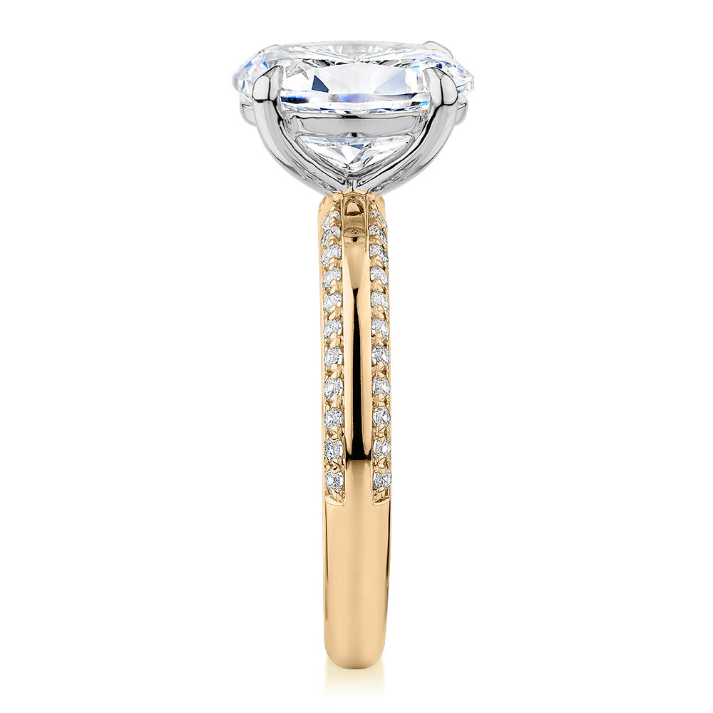 Premium Certified Lab-Grown Diamond 2.24 carat TW oval cut shouldered engagement ring in 14 carat yellow and white gold