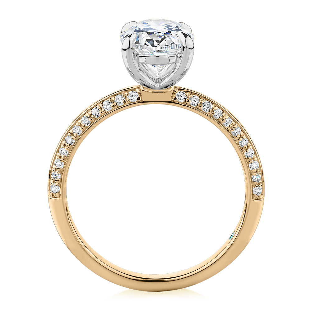 Premium Certified Lab-Grown Diamond 2.24 carat TW oval cut shouldered engagement ring in 14 carat yellow and white gold
