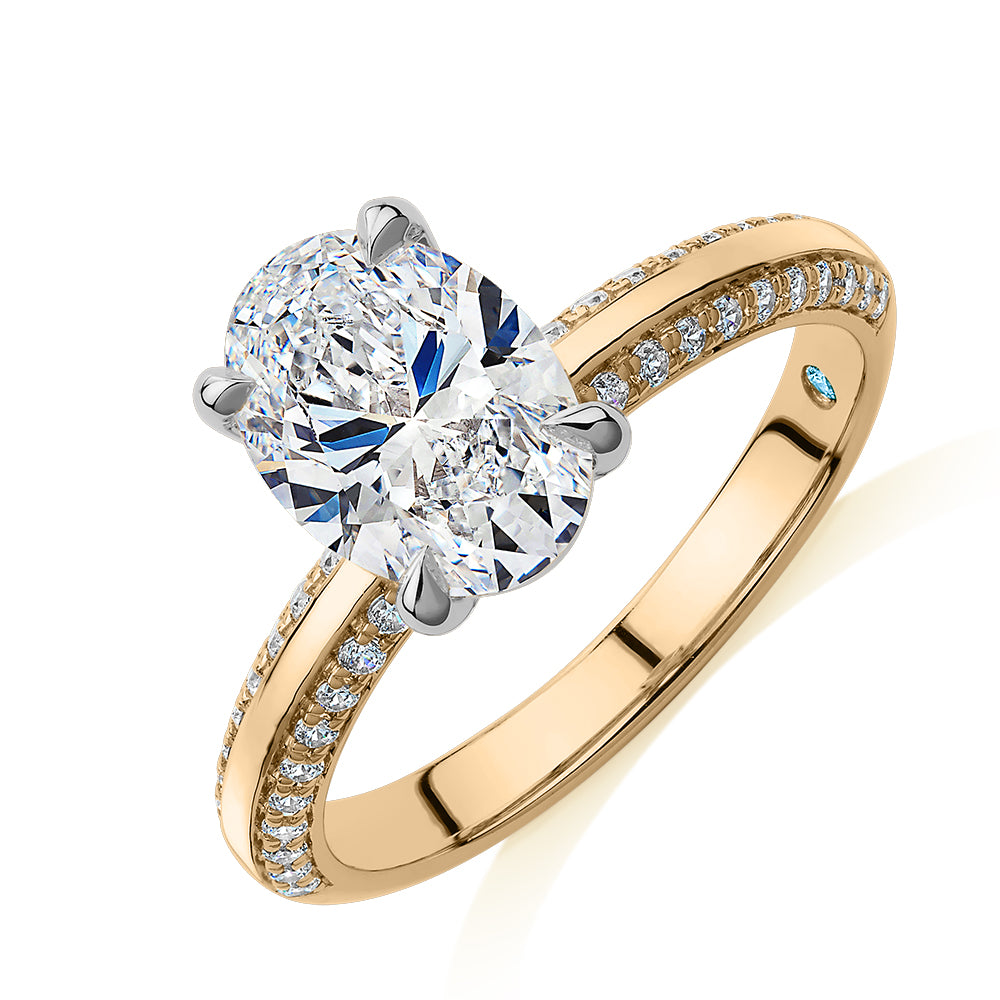 Premium Certified Lab-Grown Diamond 2.24 carat TW oval cut shouldered engagement ring in 14 carat yellow and white gold