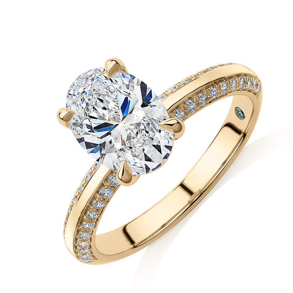 Premium Certified Lab-Grown Diamond 2.24 carat TW oval cut shouldered engagement ring in 14 carat yellow gold