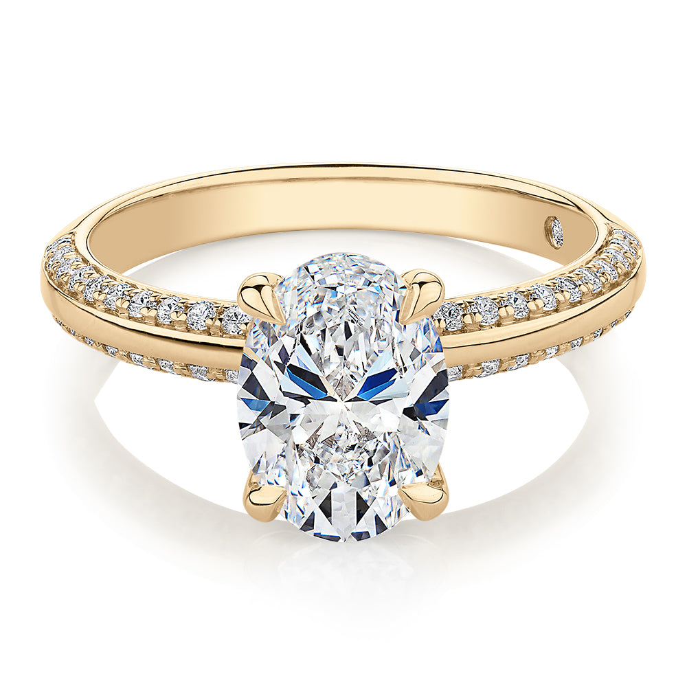 Signature Simulant Diamond 2.24 carat* TW round oval cut engagement ring in 14 carat yellow gold