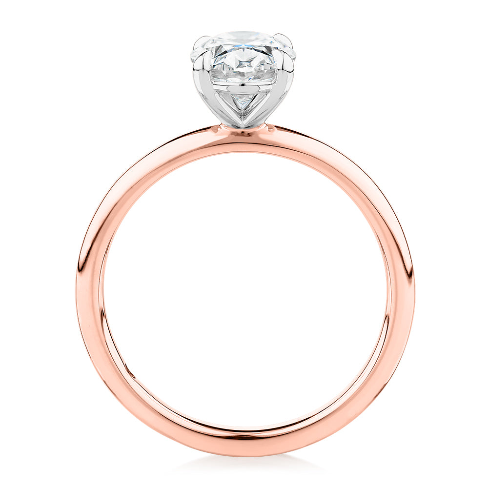 Signature Simulant Diamond 1.50 carat* oval solitaire engagement ring in 14 carat rose and white gold