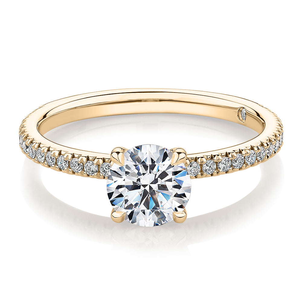 Signature Simulant Diamond 1.24 carat* TW round brilliant shouldered engagement ring in 14 carat yellow gold