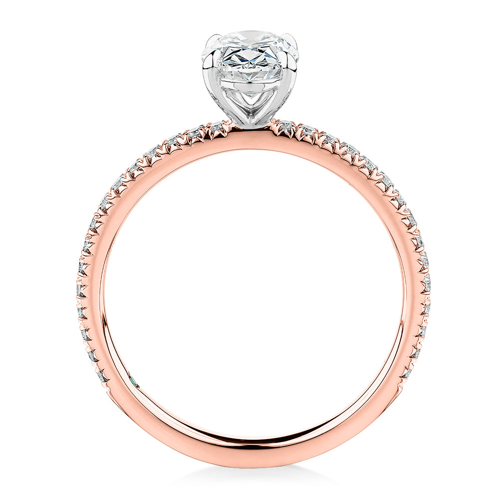 Premium Certified Laboratory Created Diamond, 1.24 carat TW oval and round brilliant shouldered engagement ring in 18 carat rose and white gold