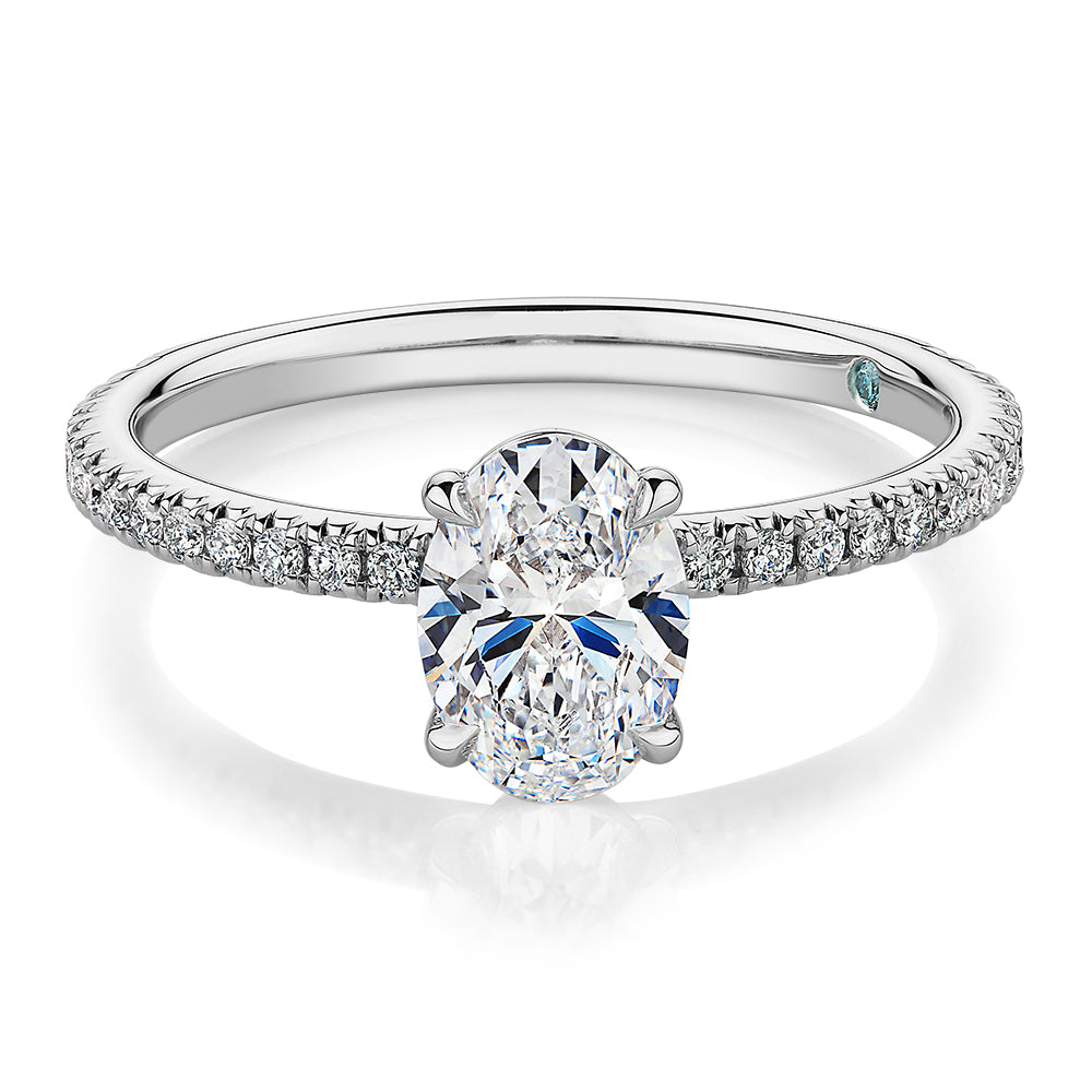 Premium Certified Laboratory Created Diamond, 1.24 carat TW oval and round brilliant shouldered engagement ring in 18 carat white gold