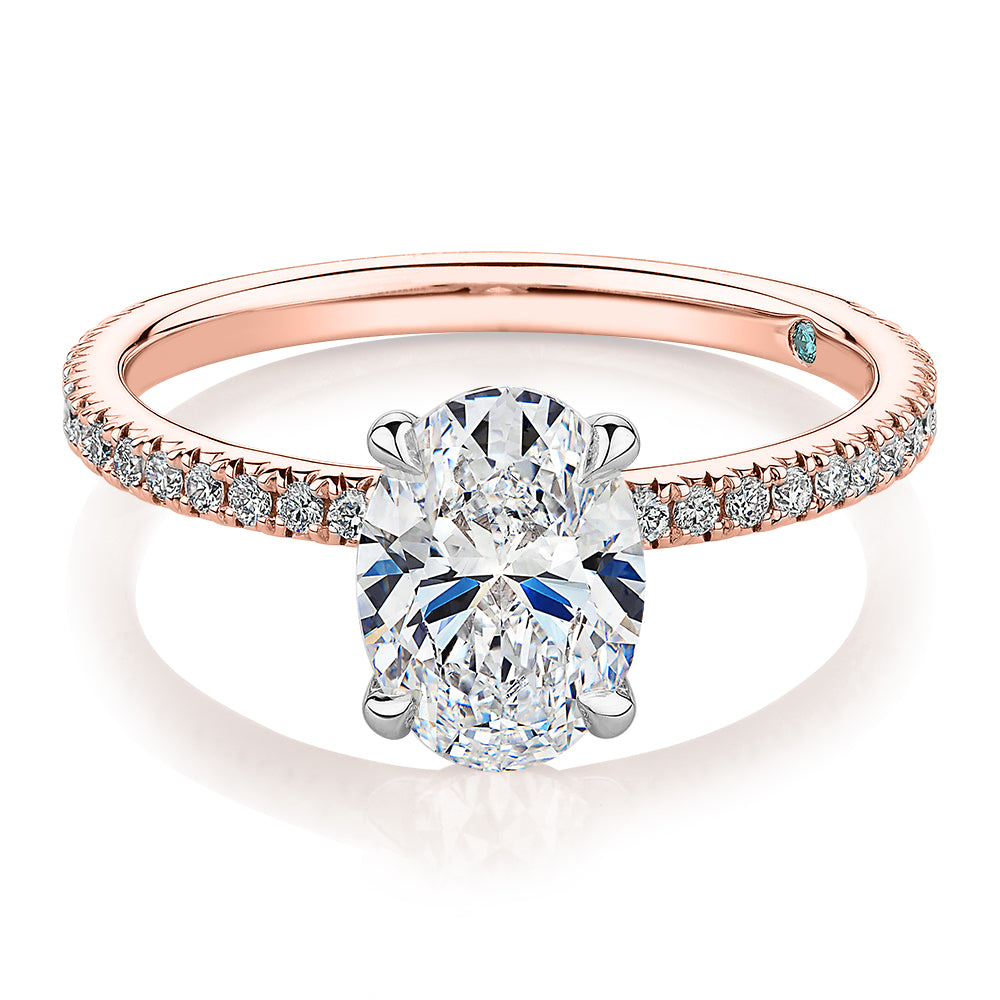 Premium Certified Laboratory Created Diamond, 1.74 carat TW oval and round brilliant shouldered engagement ring in 18 carat rose and white gold