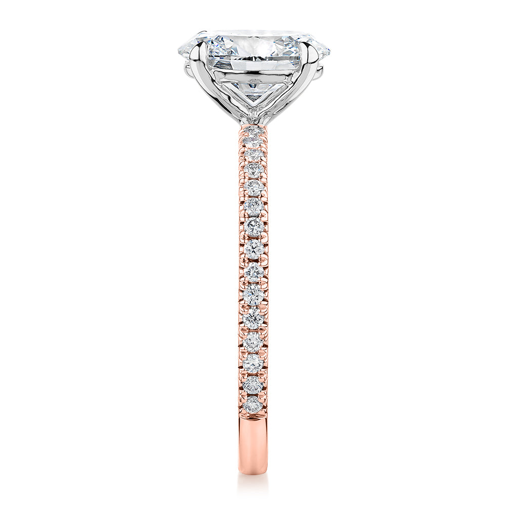 Premium Certified Laboratory Created Diamond, 1.74 carat TW oval and round brilliant shouldered engagement ring in 18 carat rose and white gold
