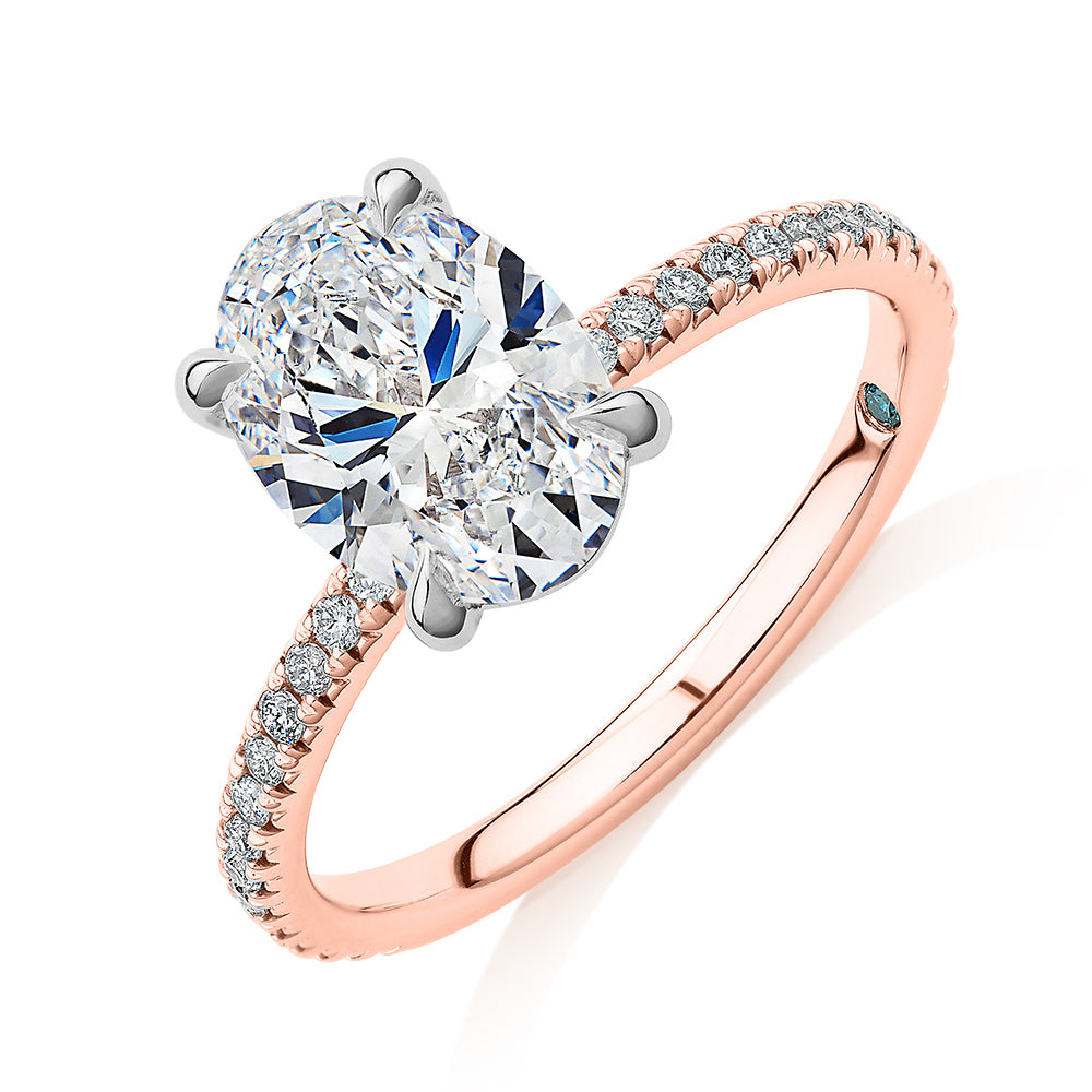 Premium Certified Laboratory Created Diamond, 2.24 carat TW oval and round brilliant shouldered engagement ring in 18 carat rose and white gold