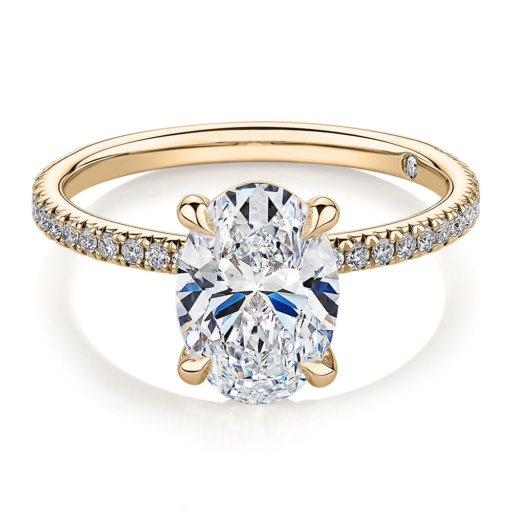 Signature Simulant Diamond 2.24 carat* TW oval and round brilliant shouldered engagement ring in 14 carat yellow gold