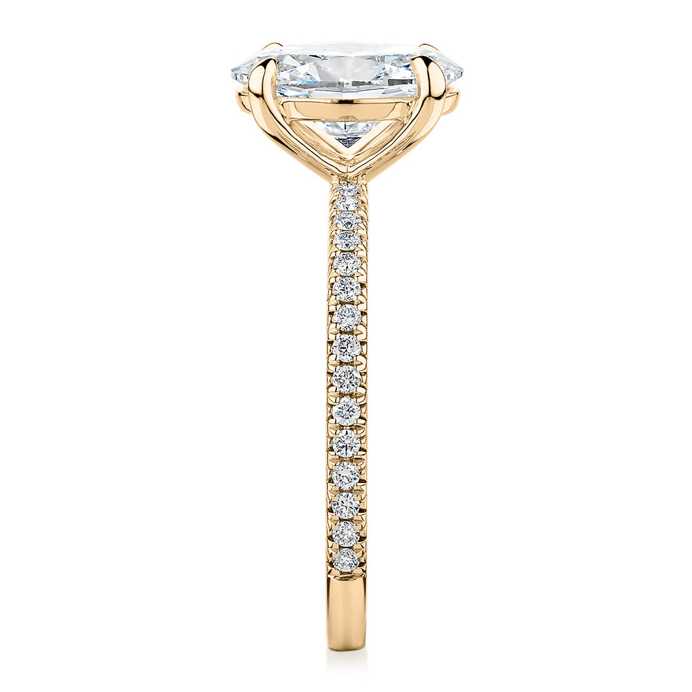 Signature Simulant Diamond 2.24 carat* TW oval and round brilliant shouldered engagement ring in 14 carat yellow gold