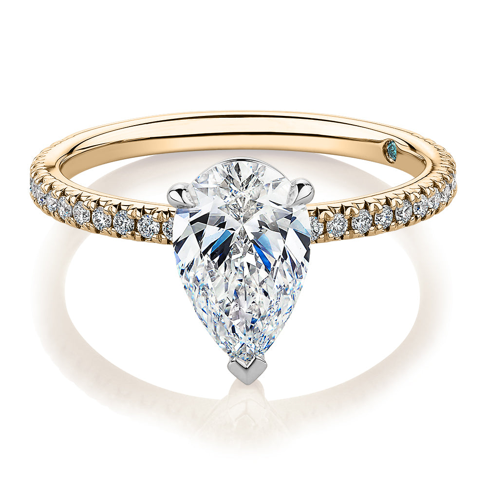 Premium Certified Laboratory Created Diamond, 1.74 carat TW pear and round brilliant shouldered engagement ring in 18 carat yellow and white gold