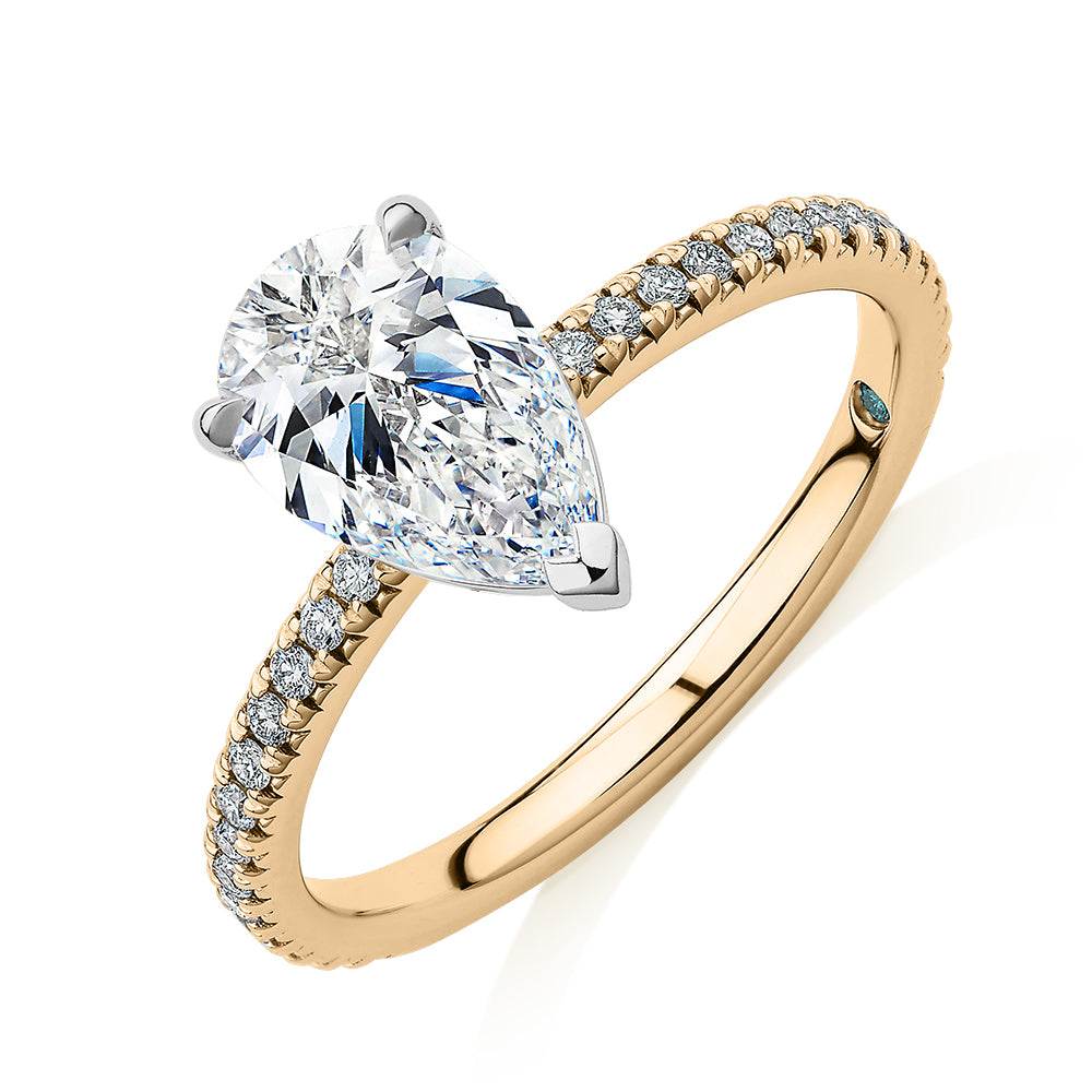 Premium Certified Laboratory Created Diamond, 1.74 carat TW pear and round brilliant shouldered engagement ring in 18 carat yellow and white gold