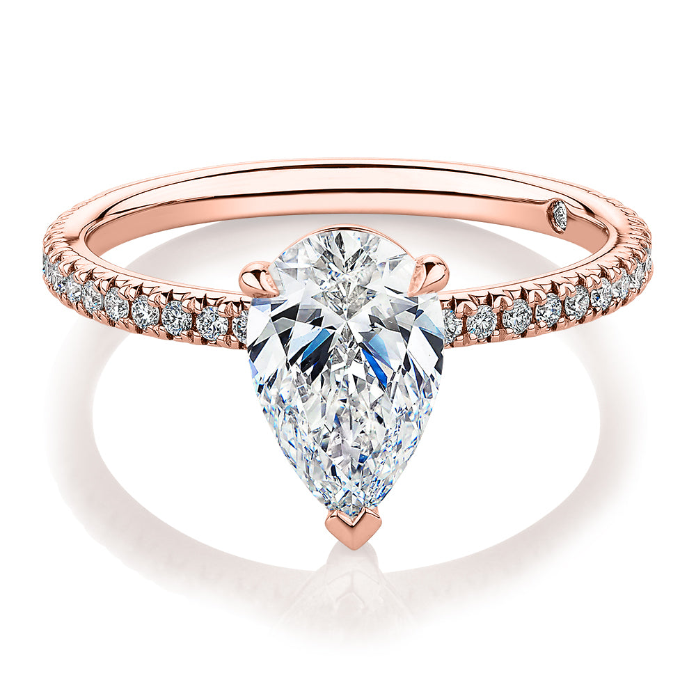 Signature Simulant Diamond 1.74 carat* TW pear and round brilliant shouldered engagement ring in 14 carat rose gold