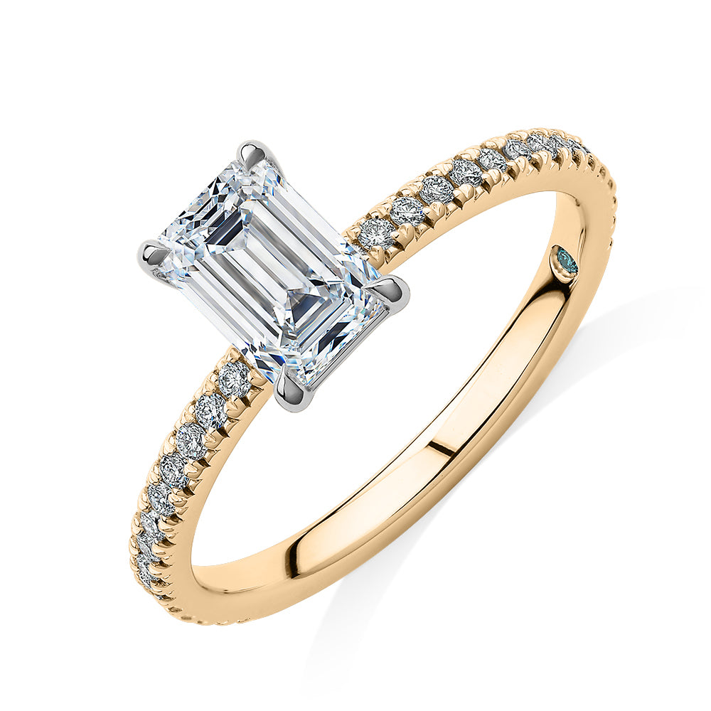 Premium Certified Laboratory Created Diamond, 1.24 carat TW emerald cut and round brilliant shouldered engagement ring in 18 carat yellow and white gold