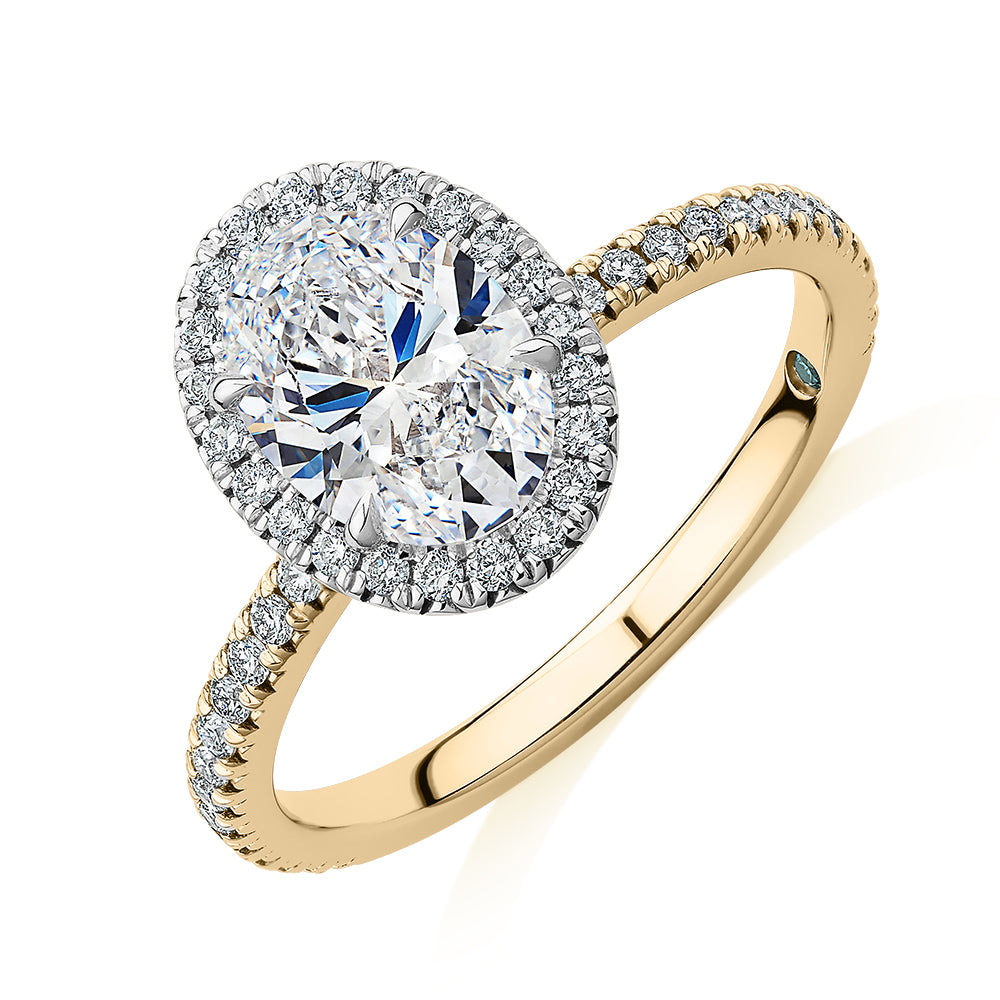 Premium Certified Lab-Grown Diamond, 1.89 carat TW oval and round brilliant halo engagement ring in 14 carat yellow and white gold