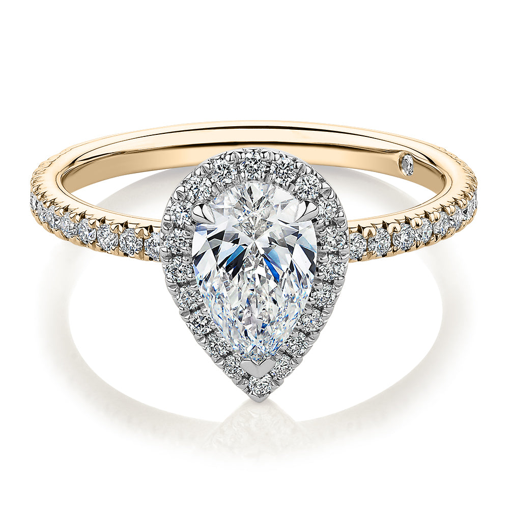 Signature Simulant Diamond 1.37 carat* TW pear and round brilliant halo engagement ring in 14 carat yellow and white gold