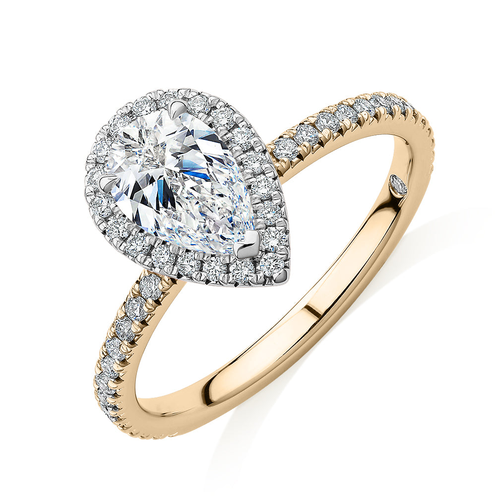 Signature Simulant Diamond 1.37 carat* TW pear and round brilliant halo engagement ring in 14 carat yellow and white gold