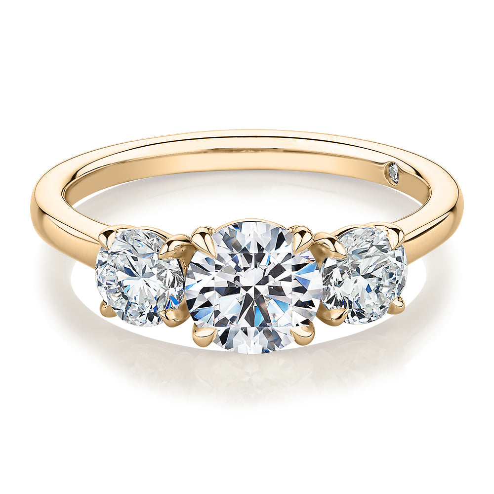 Signature Simulant Diamond 1.86 carat* TW round brilliant three stone ring in 14 carat yellow gold