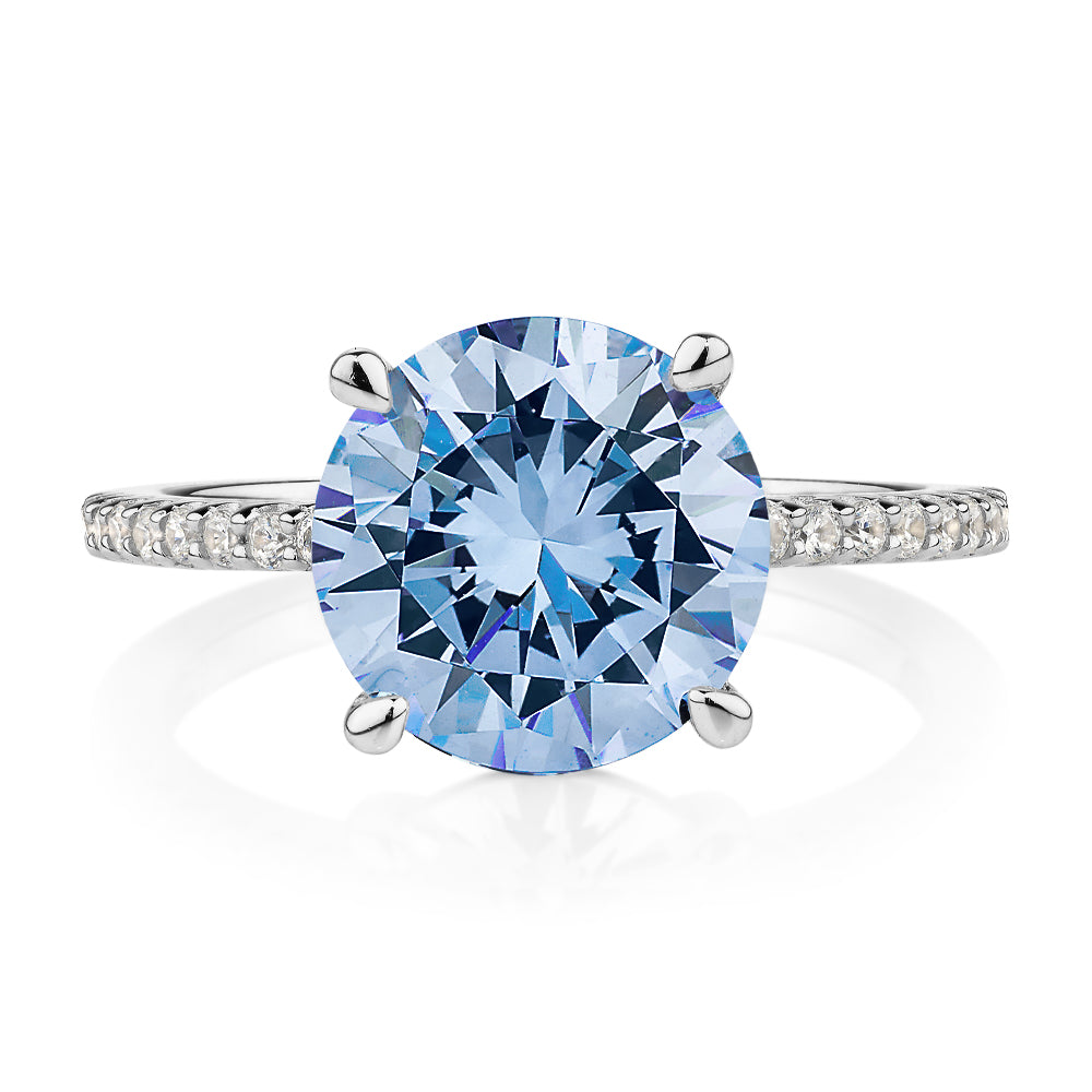 Dress ring with blue topaz simulant in sterling silver
