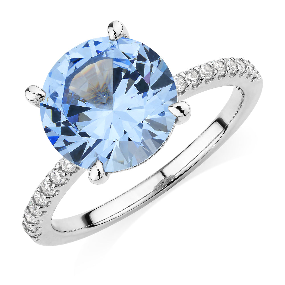 Dress ring with blue topaz simulant in sterling silver