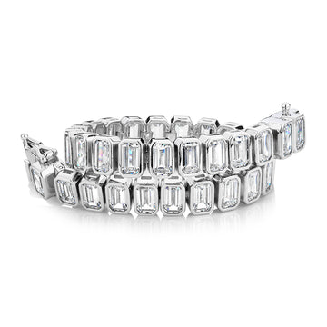 Emerald Cut tennis bracelet with 29.04 carats* of diamond simulants in sterling silver