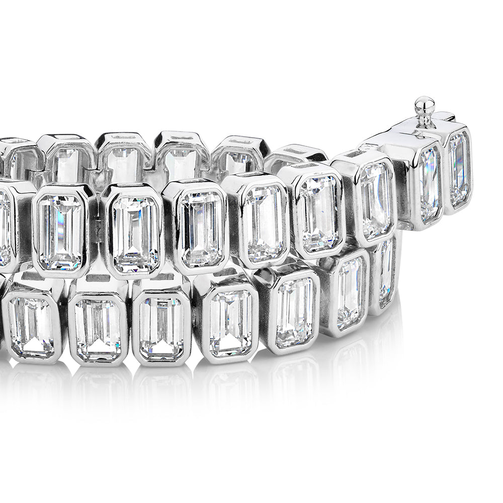 Emerald Cut tennis bracelet with 29.04 carats* of diamond simulants in sterling silver