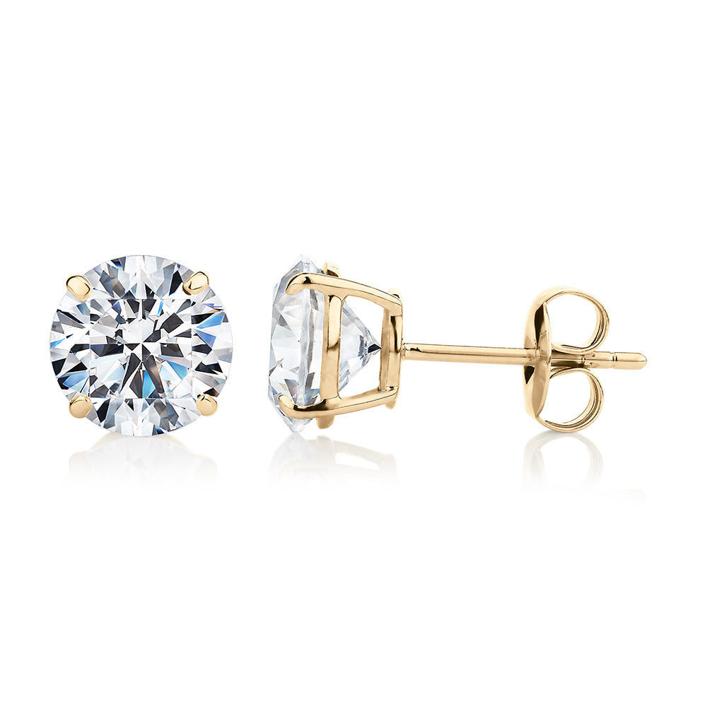 Round Brilliant stud earrings with 4 carats* of diamond simulants in 10 carat yellow gold