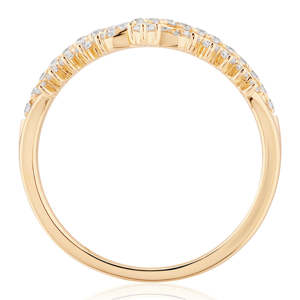 Round Brilliant curved wedding or eternity band with 0.27 carats* of diamond simulants in 10 carat yellow gold