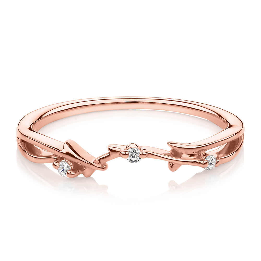 Wedding or eternity band with diamond simulants in 14 carat rose gold