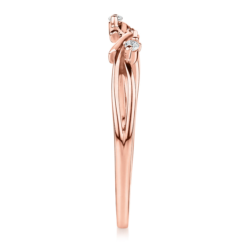 Wedding or eternity band with diamond simulants in 14 carat rose gold