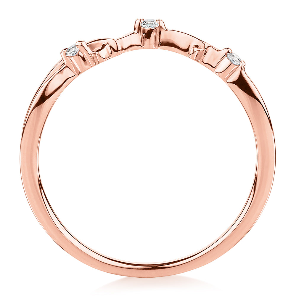 Wedding or eternity band with diamond simulants in 14 carat rose gold