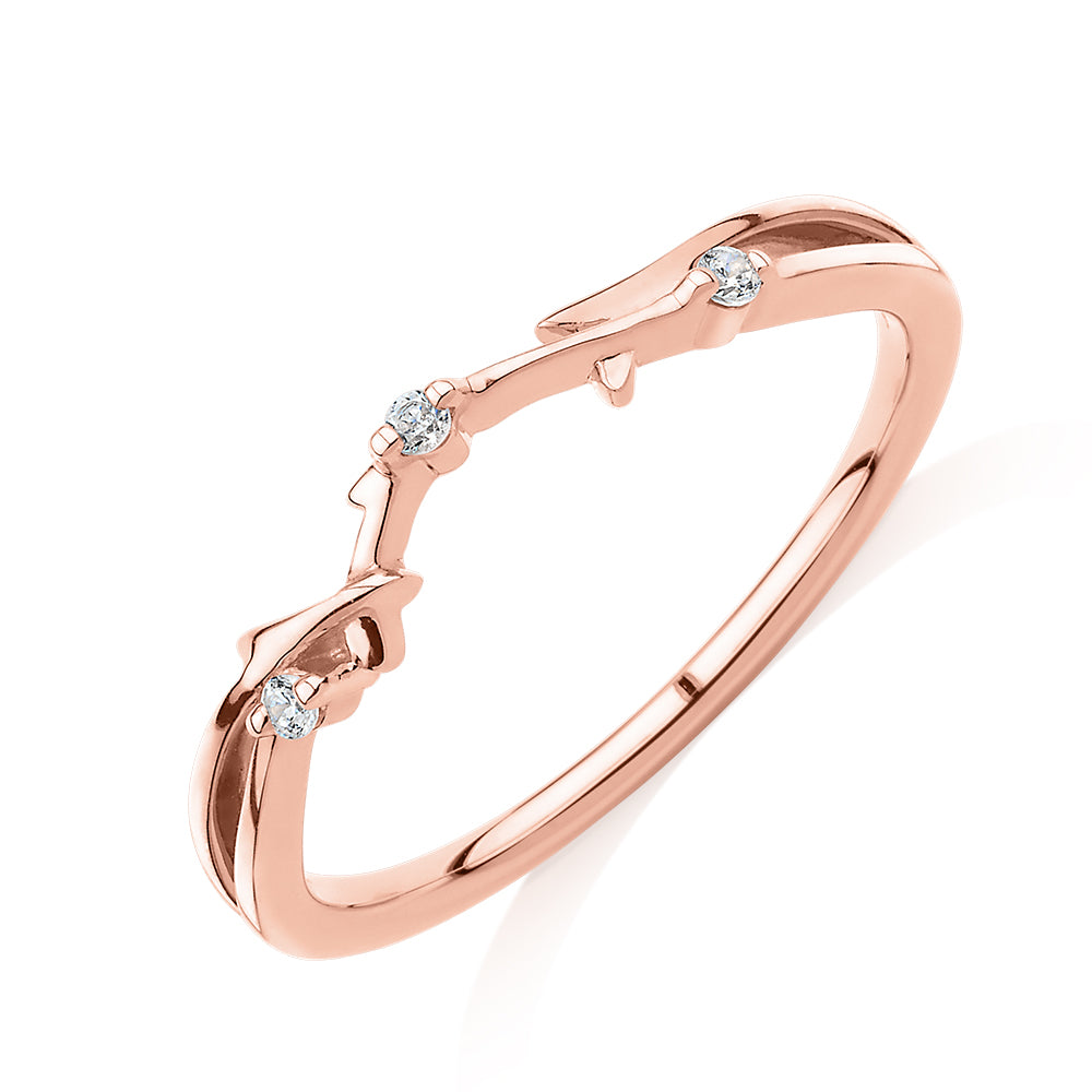 Wedding or eternity band with diamond simulants in 14 carat rose gold