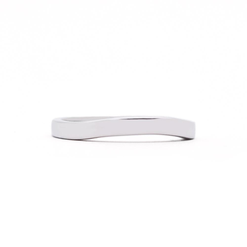 Curved flat wedding band in 14 carat white gold