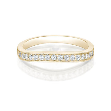 Curved wedding or eternity band with 0.25 carats* of diamond simulants in 14 carat yellow gold