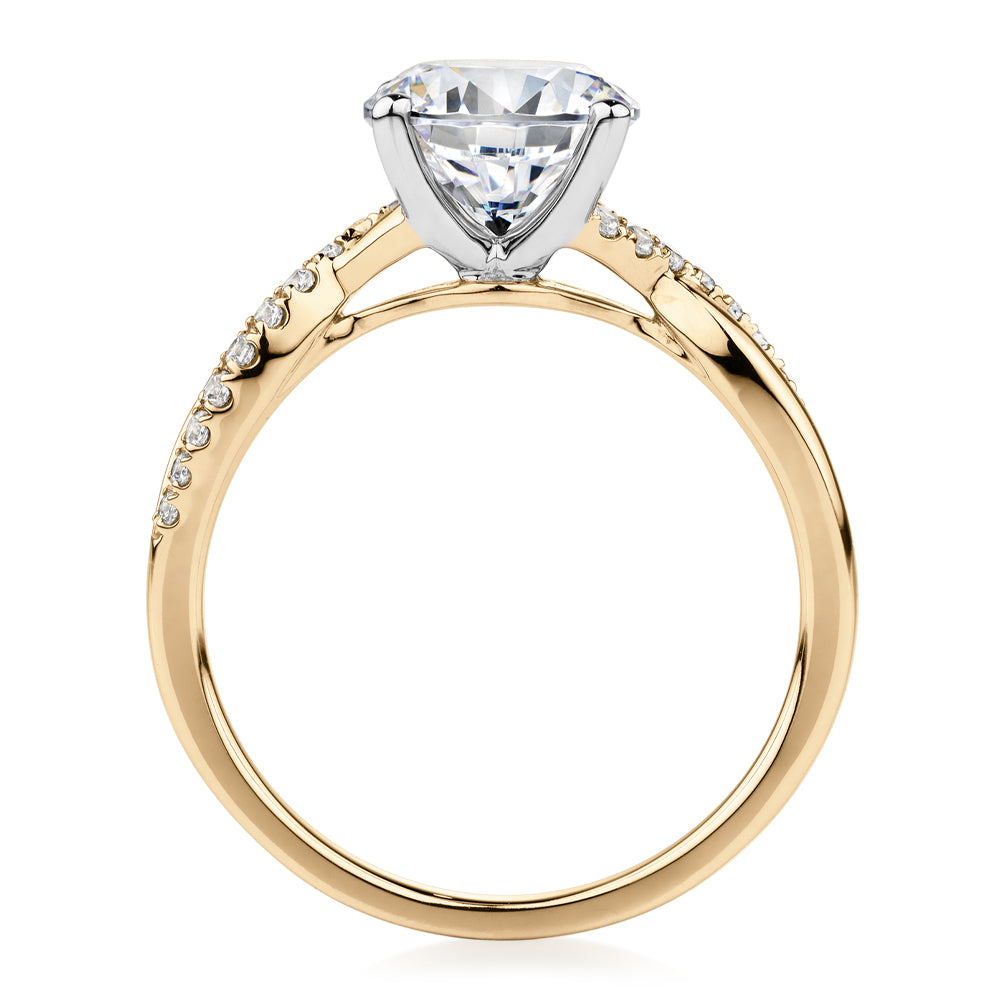 Round Brilliant shouldered engagement ring with 2.17 carats* of diamond simulants in 14 carat yellow and white gold